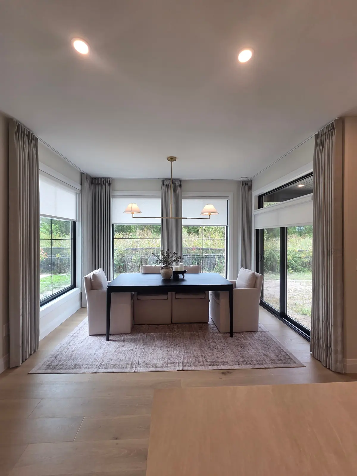 Dining Nook Drapery & Roller Shades by WE Blinds